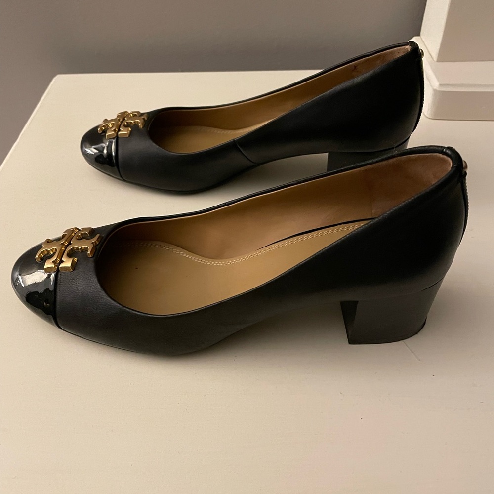 Tory Burch black pumps.